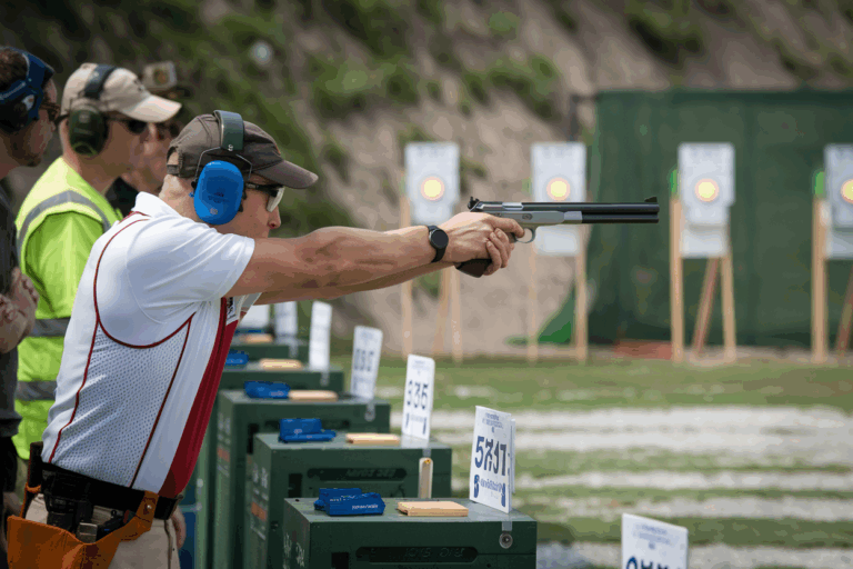 exciting handgun shooting competition taking place at an outdoor shooting range.